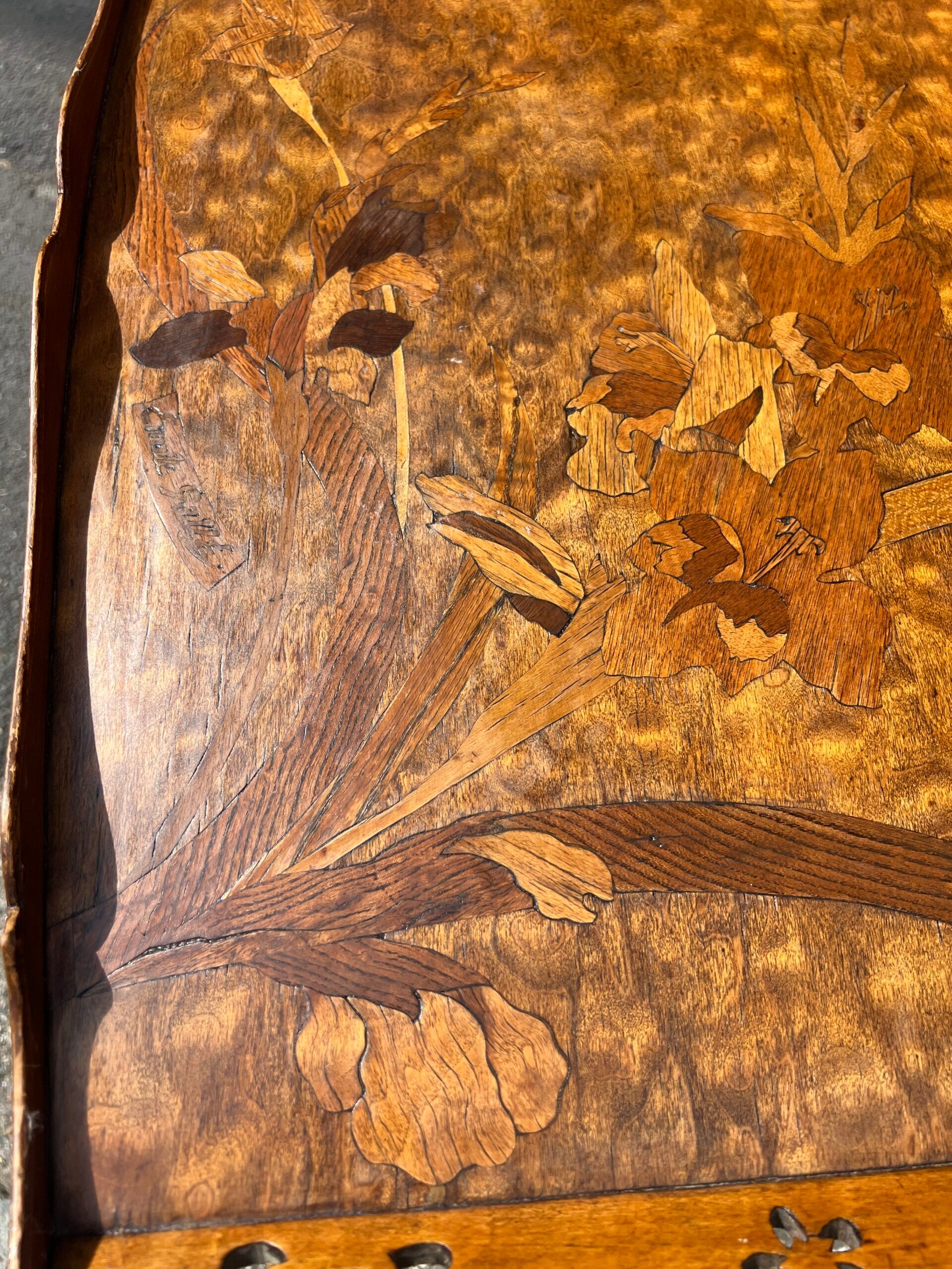 Art Nouveau period two-tiered tea table in veneered wood, signed Émile Gallé