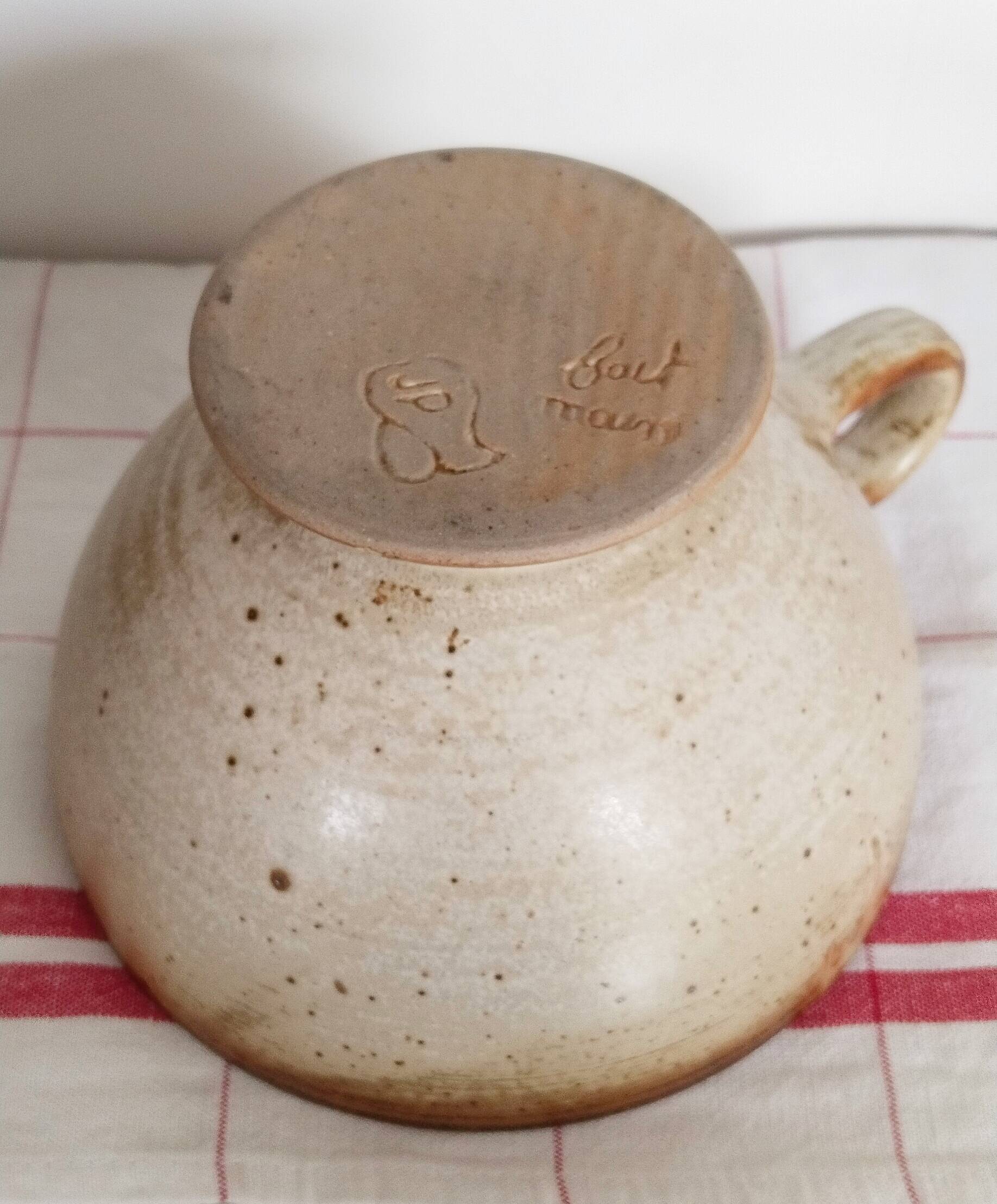 Large handmade stoneware bowl with foot