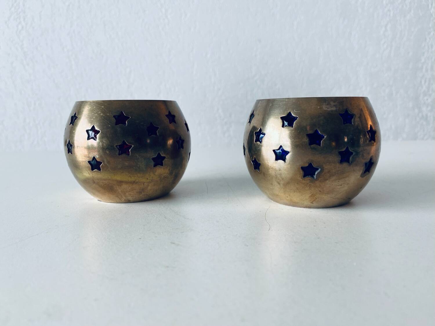 Pair of brass and glass tealight holders