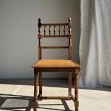 Chaise classique ancienne en bois et cannage