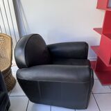 Matching black leather armchair – comfort and elegance