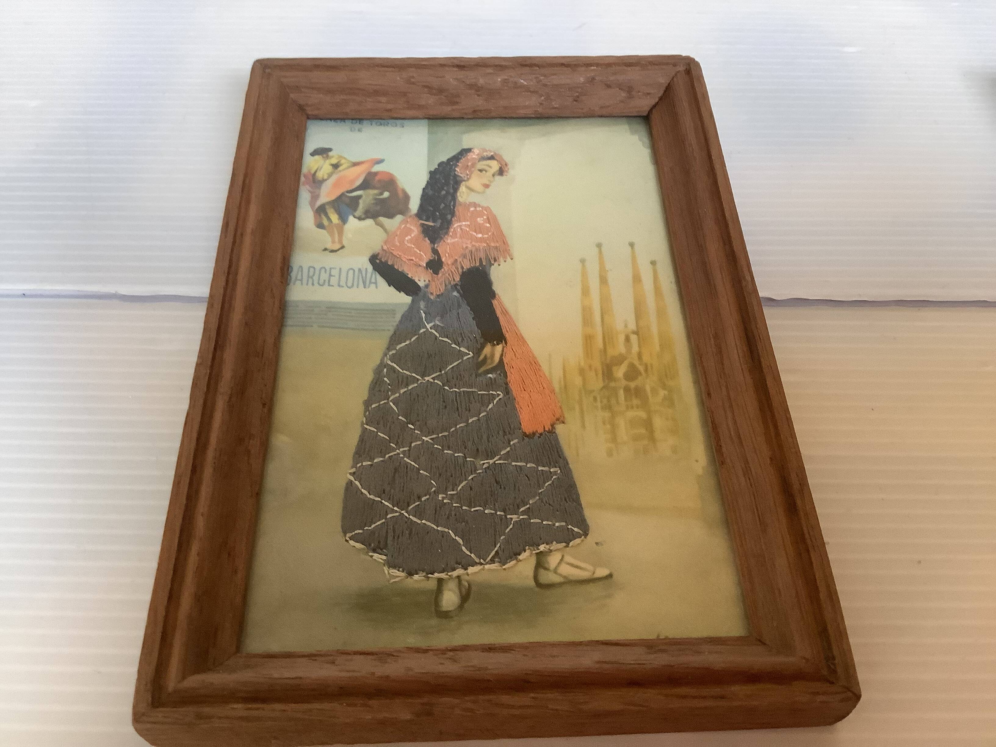 Pair of small frames with Spanish illustrations