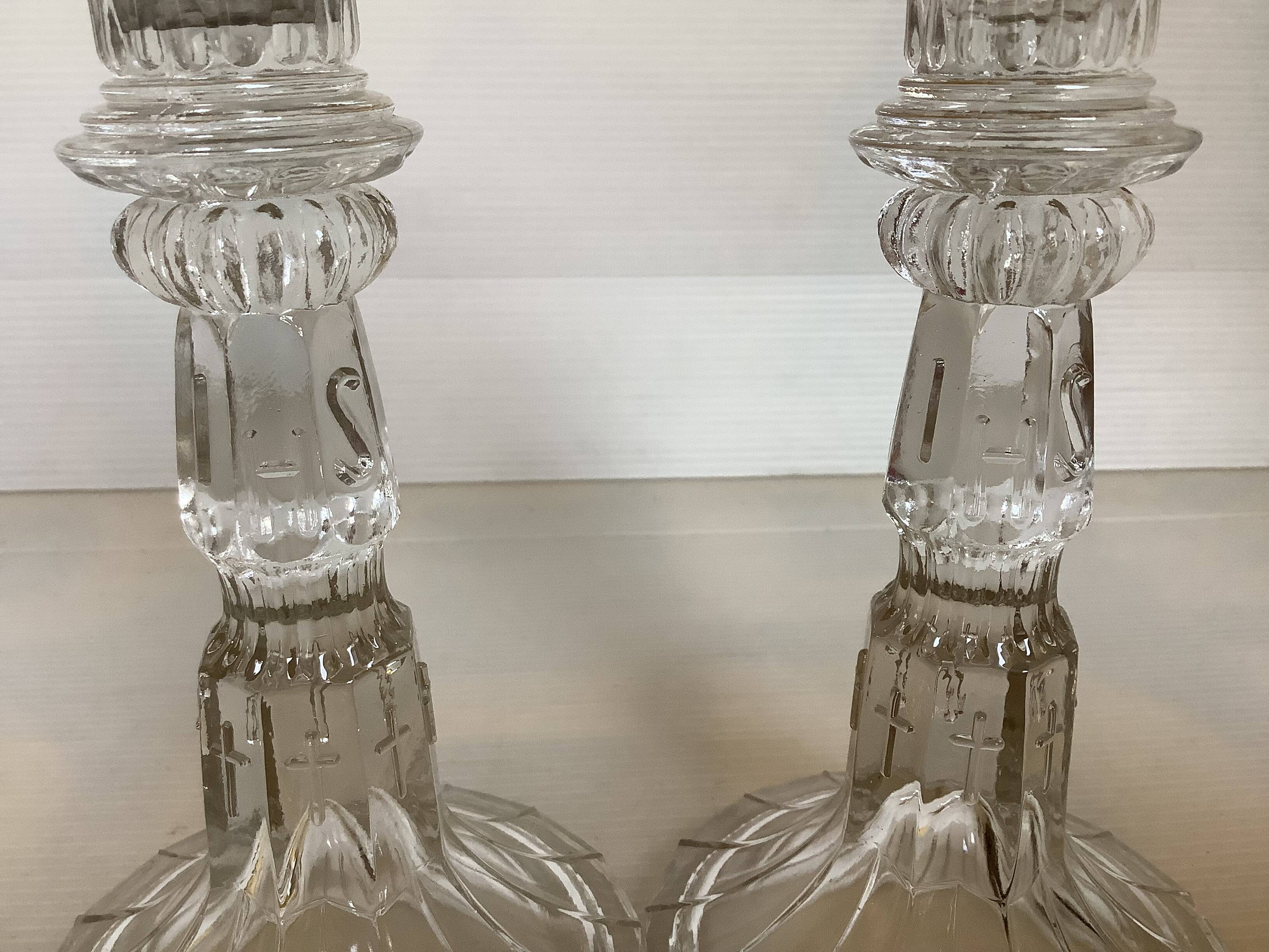 Pair of moulded glass candlesticks
