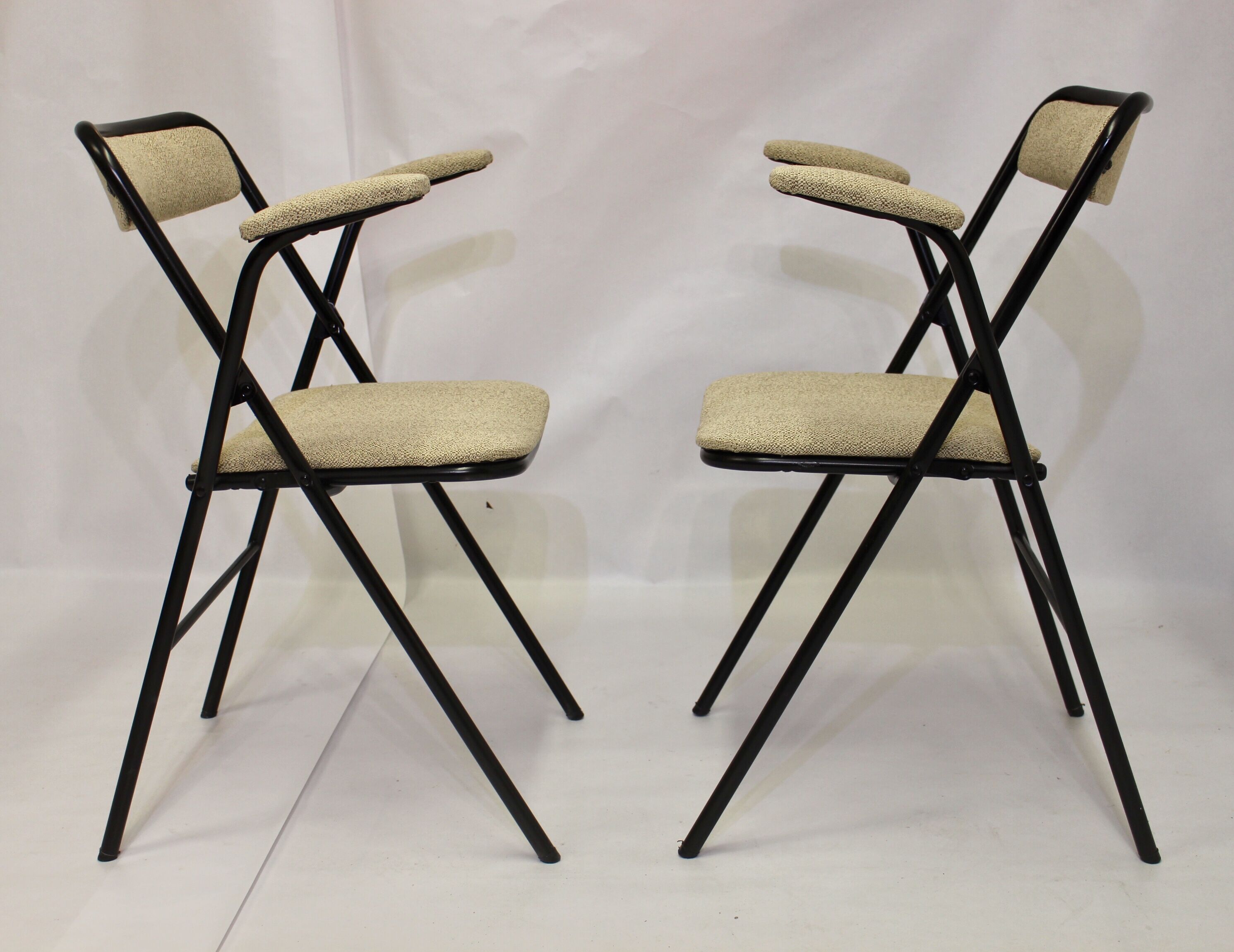 Pair of folding chairs with vintage armrests, 70s