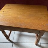 Small footrest bench in bohemian style.