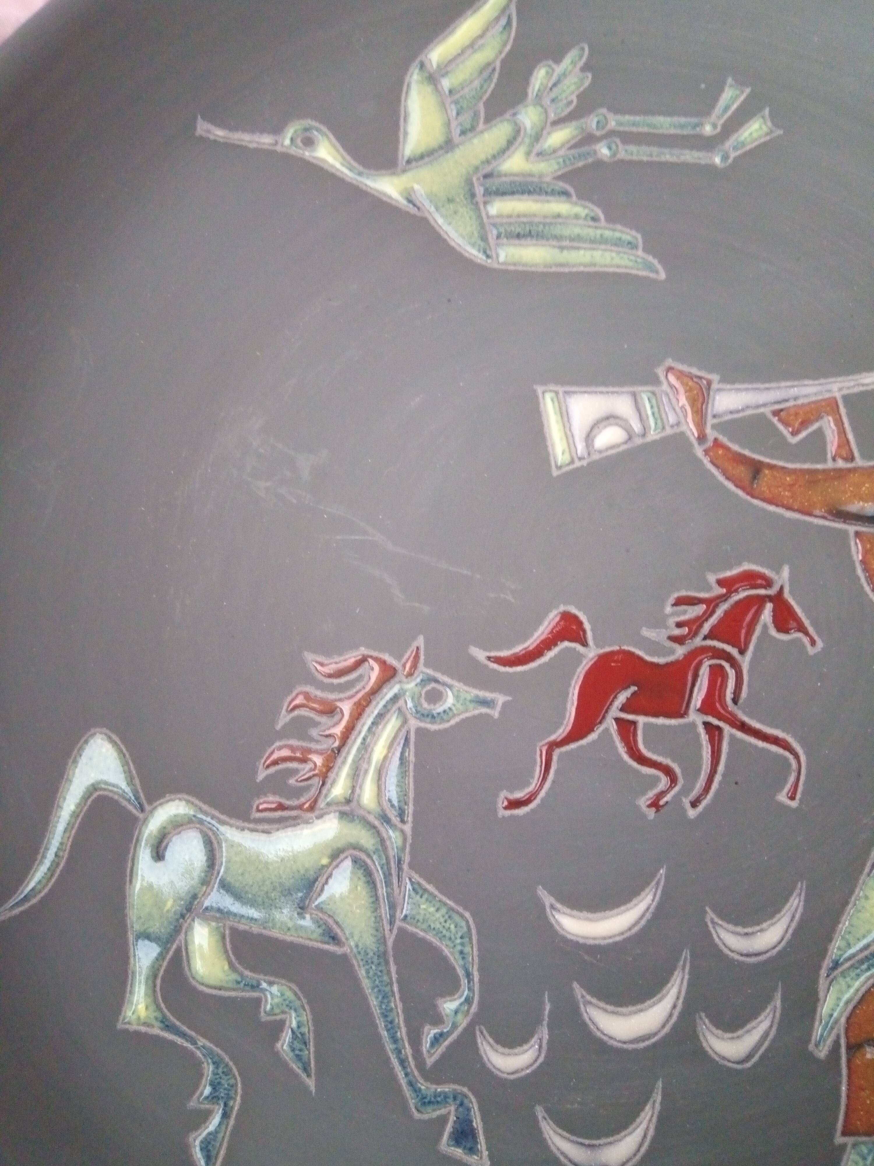 Rare pair of ceramic plates and enamel with mythological decoration. The 50s.