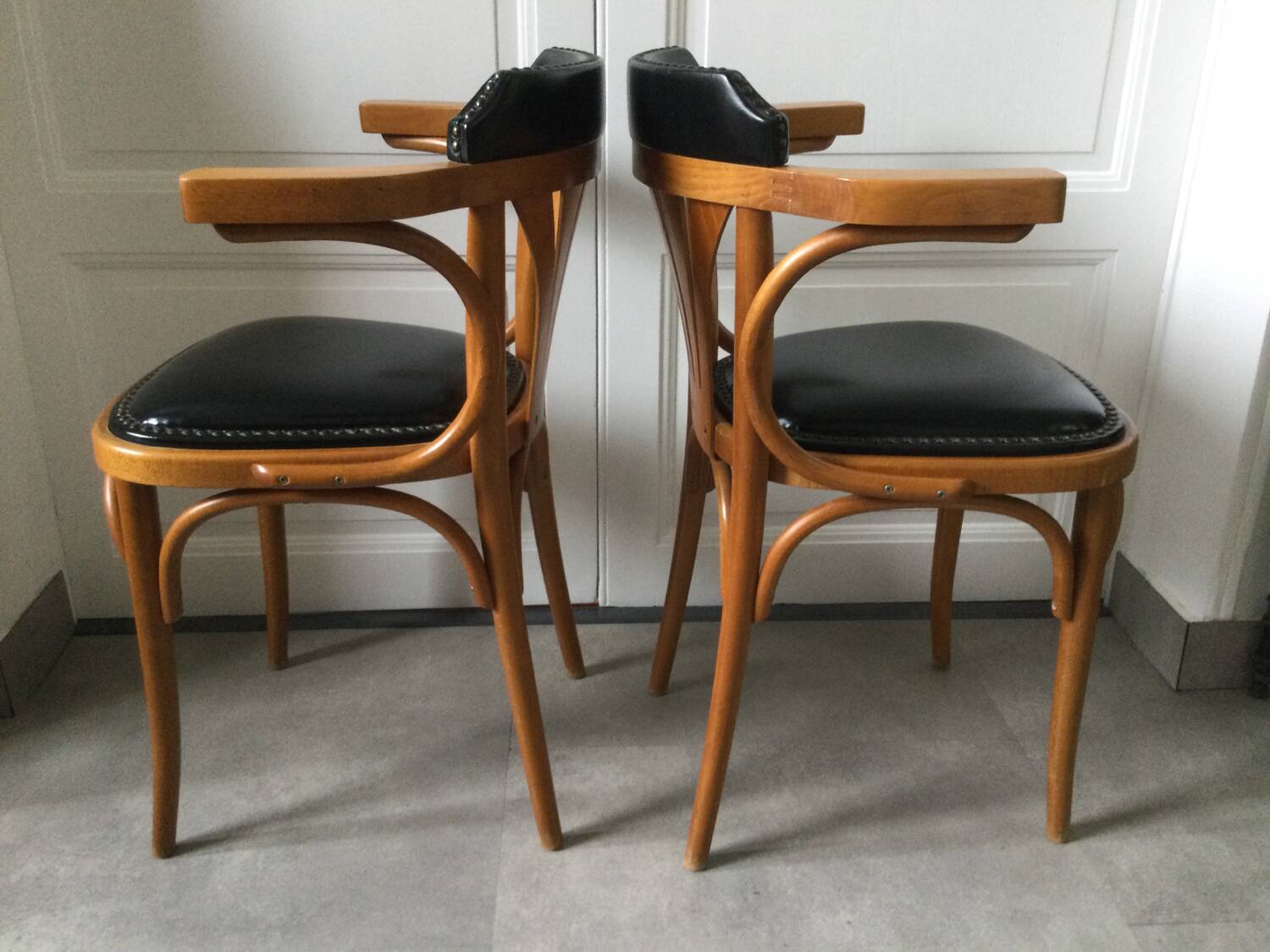 Pair of curved wooden bistro armchairs