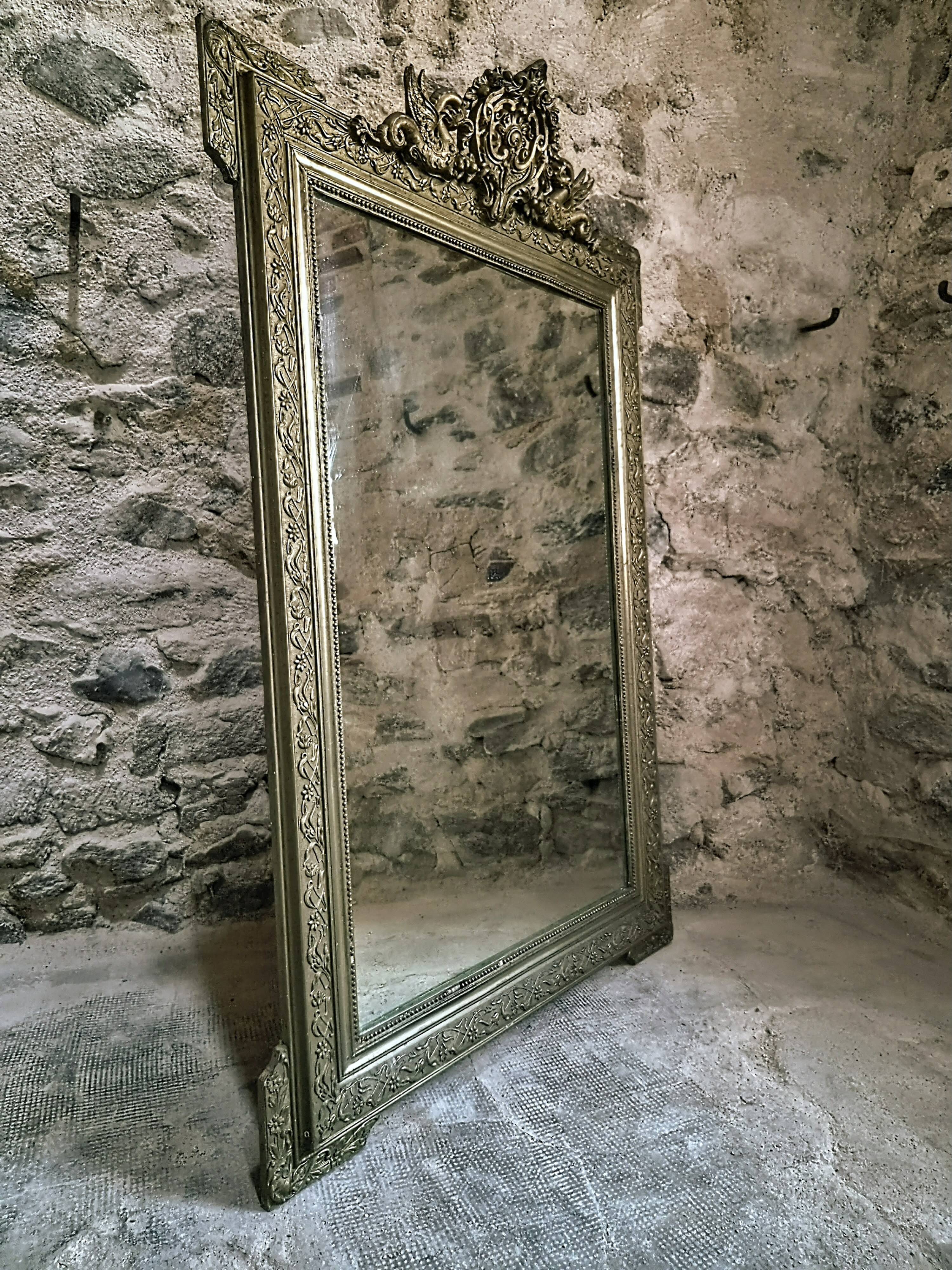 Large French mirror in Napoléon III style with a composition frame, circa 1880–1900.
