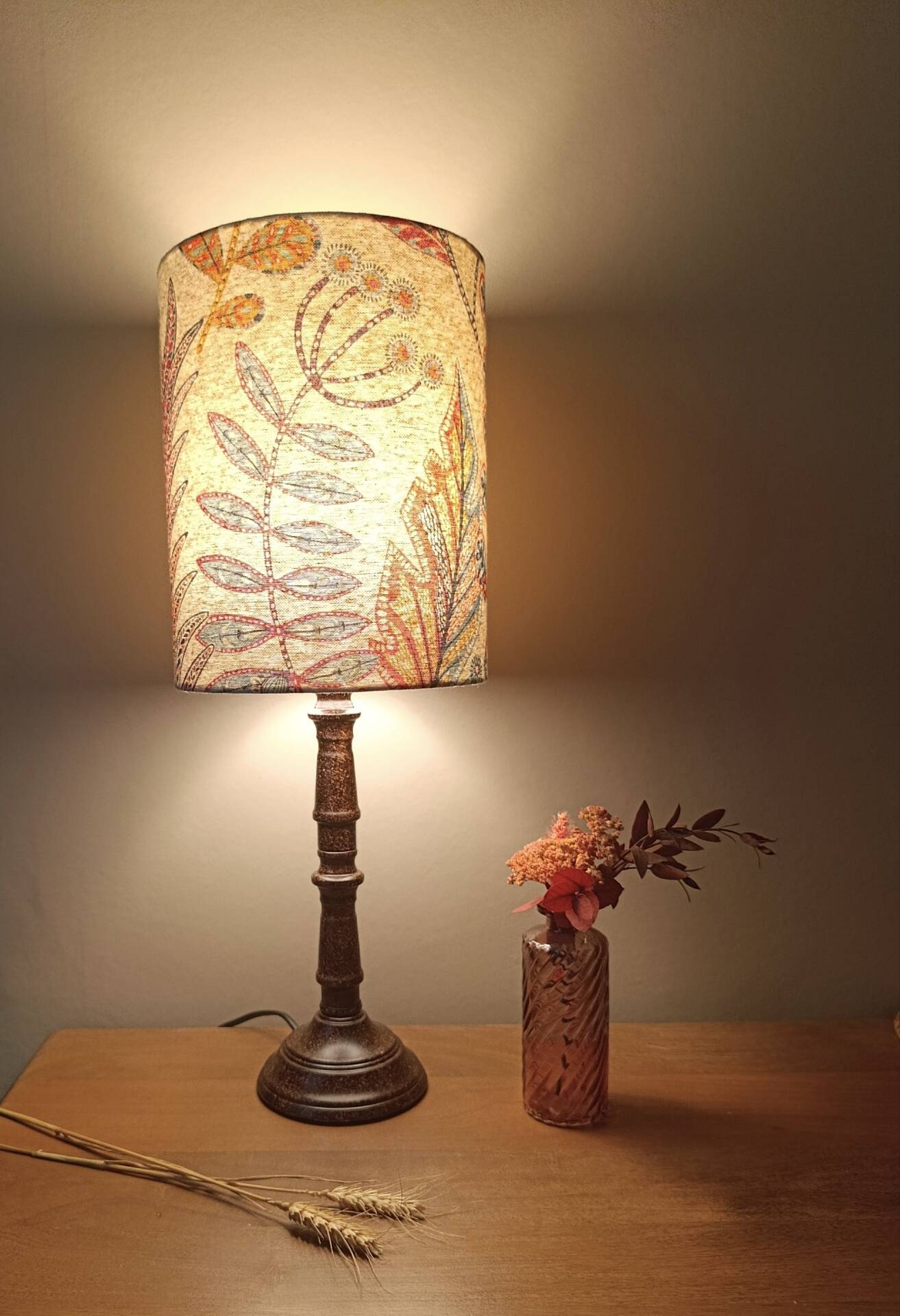 Aged metal table lamp, botanical shade