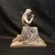 Statuette of a woman in gilded cast iron (Joan of Arc?)