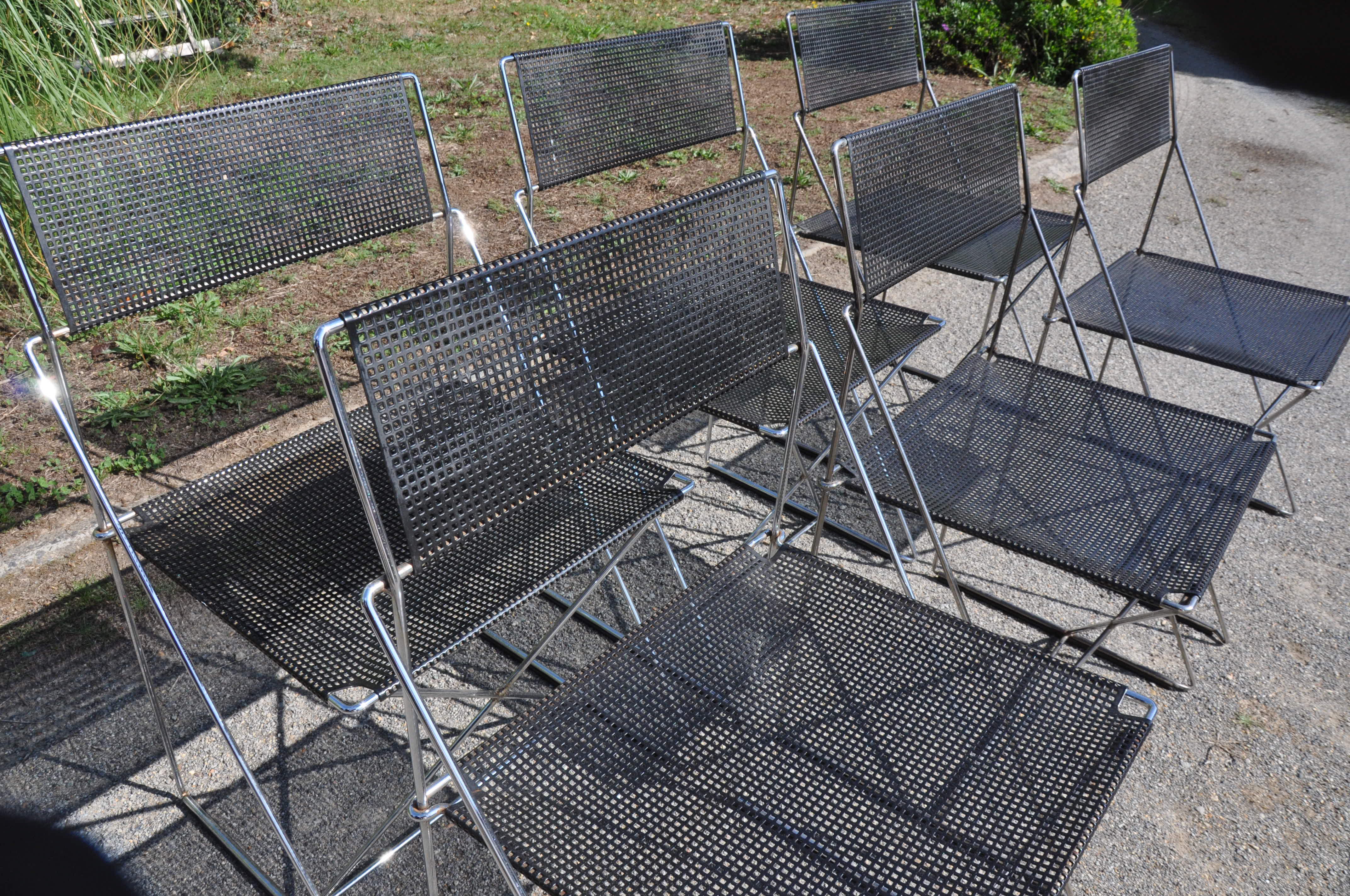 Nuova x line omli chairs by Niels Jørgen Haugesen