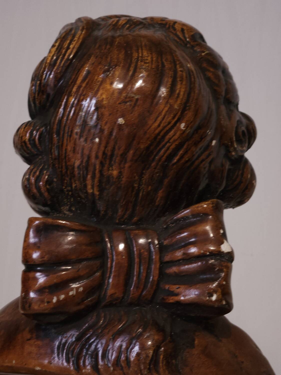 Bust of a young man in antique plaster.