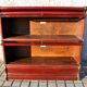 Mahogany glass-fronted bookcase THE GLOBE WERNICKE LONDON 1900, a piece of furniture