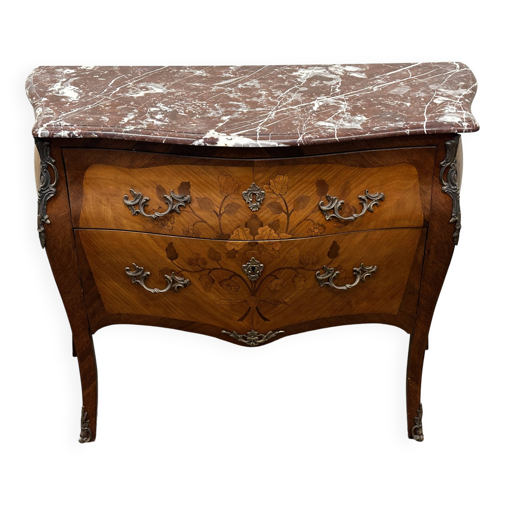 Curved and inlaid Louis XV style chest of drawers