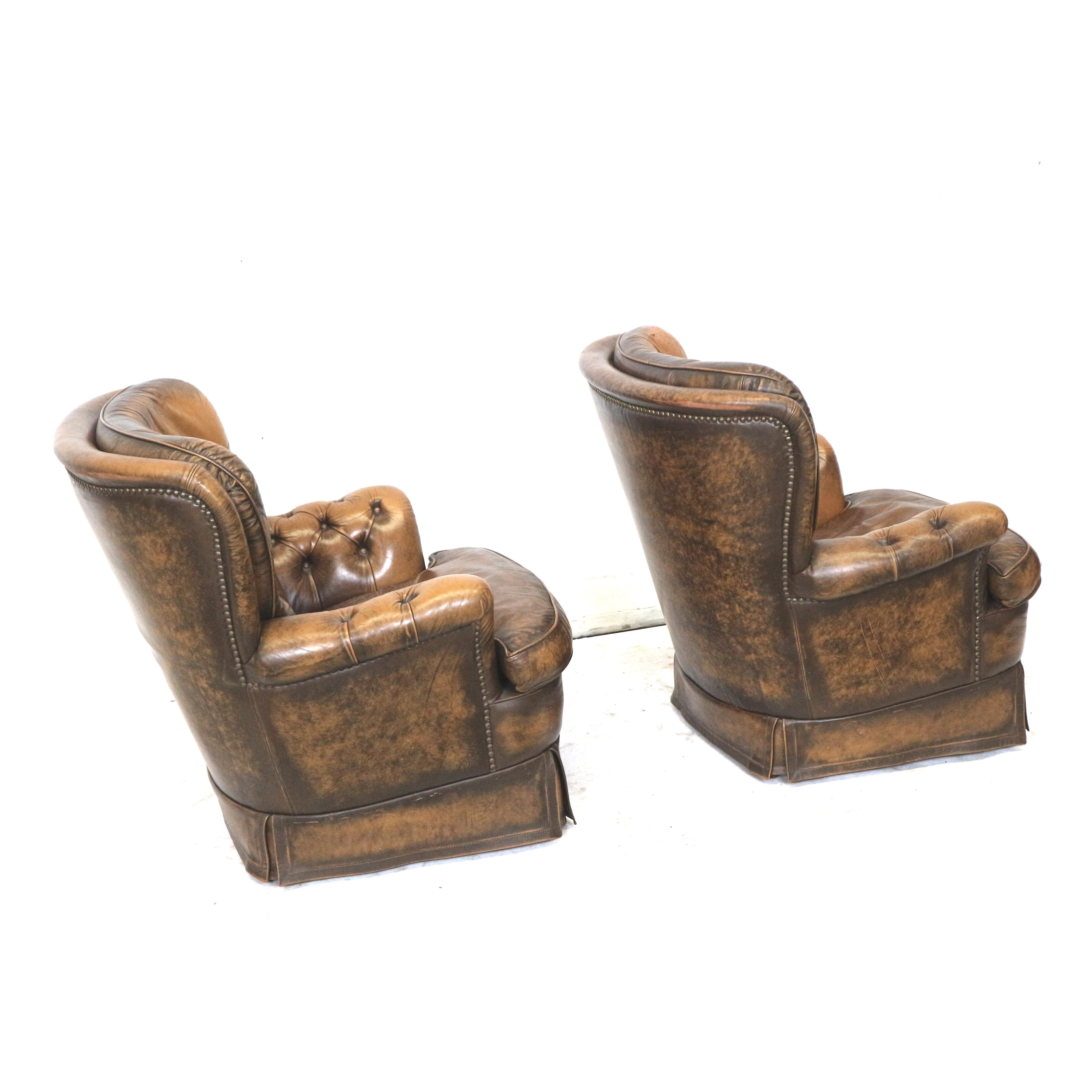 Set of 2 leather armchairs from the 1970s