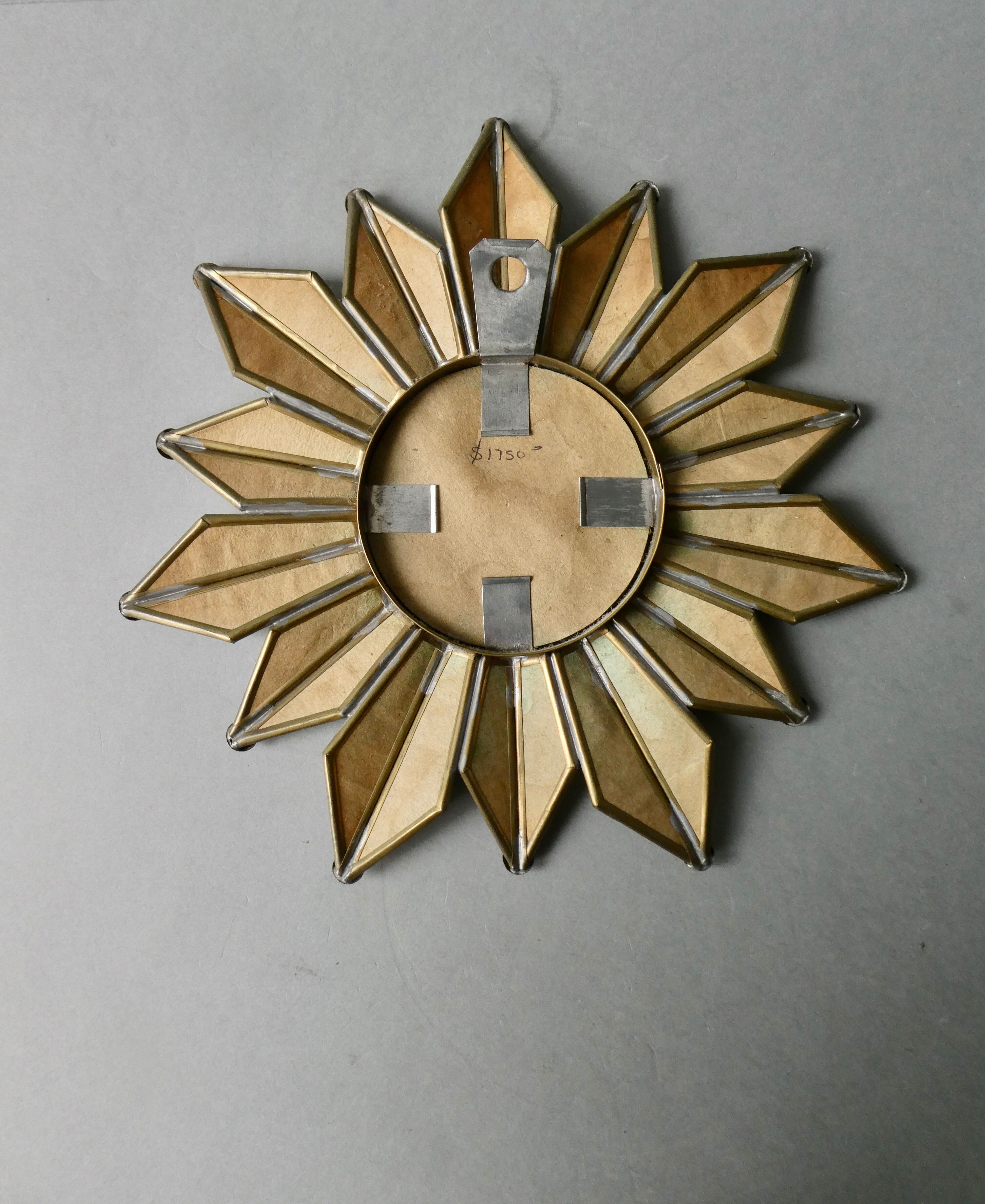 Mirror shape sun with parecloses of mirrors