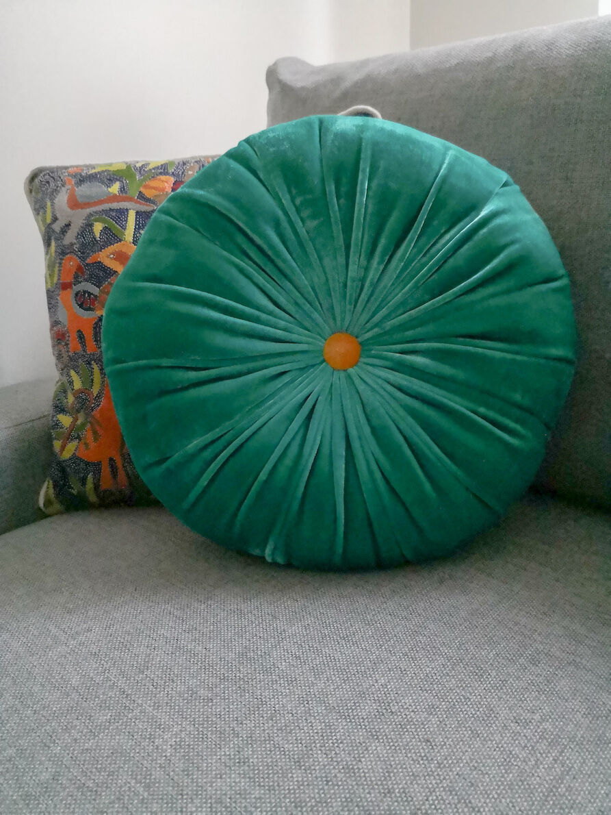 Turquoise round cushion