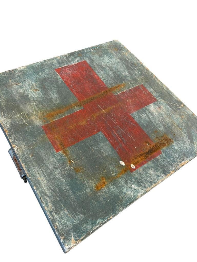 Vintage grey wooden chest with red cross 'first aid'