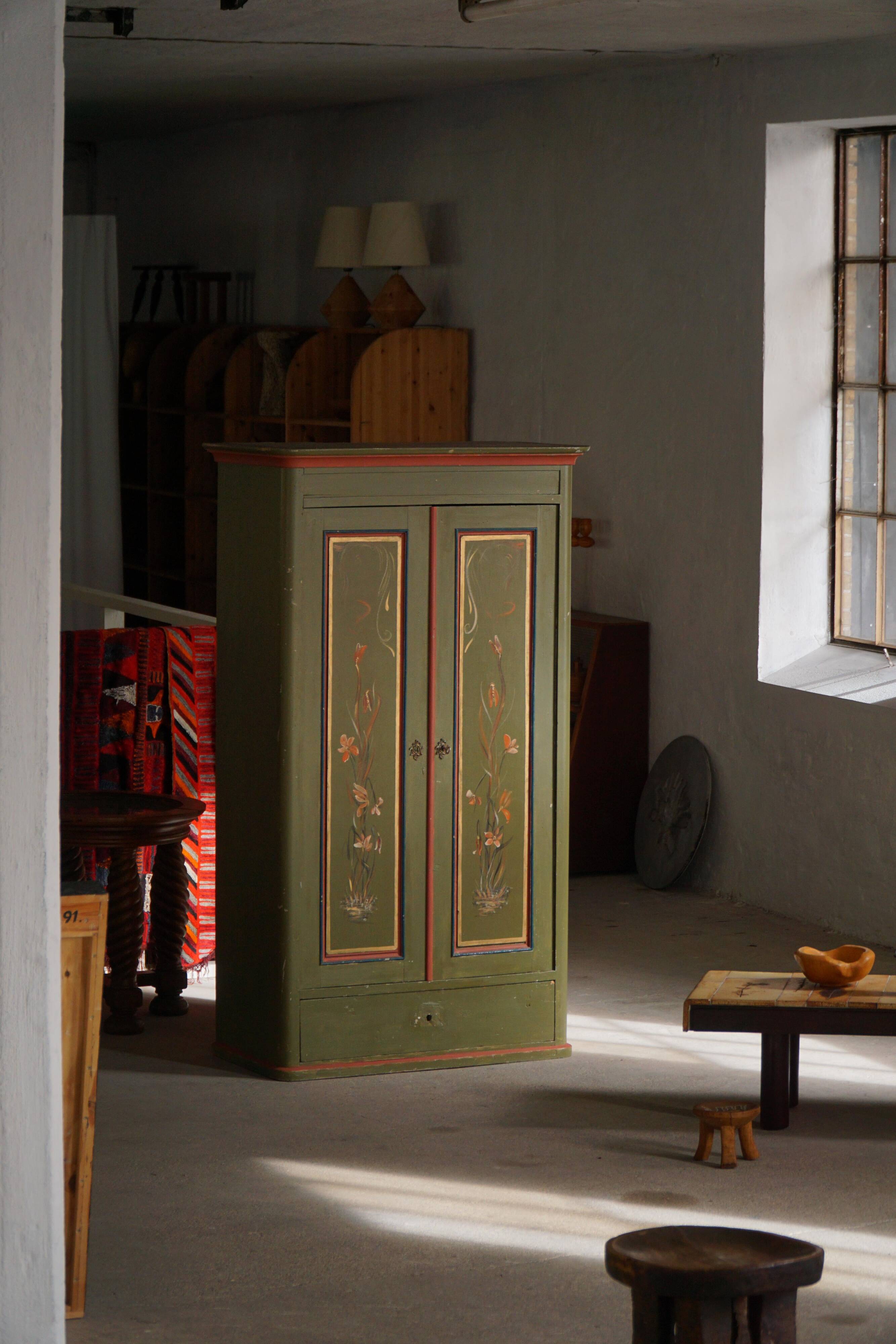 Old Danish cupboard painted with floral patterns, folk art, 19th century.