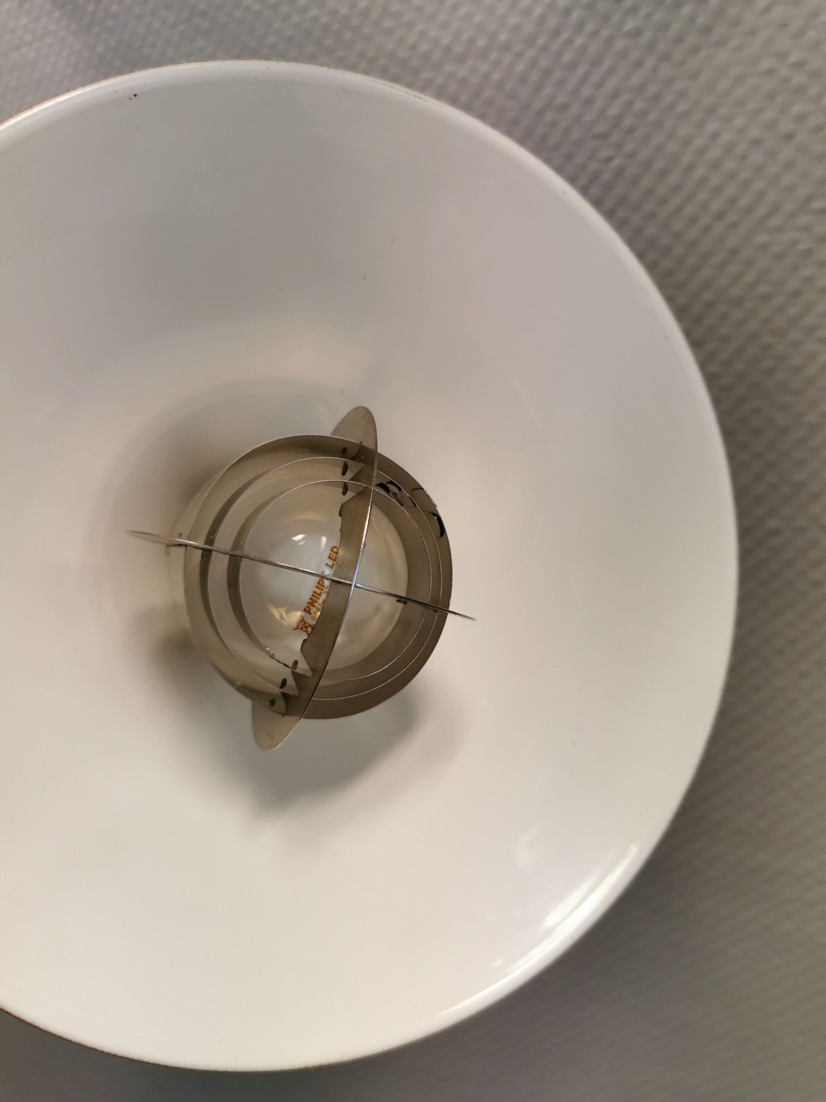 Copper hanging lamp with brass colored top and white inside lacquer.