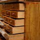 Queen Anne style pedestal commode from around 1710 in walnut and oyster veneer.