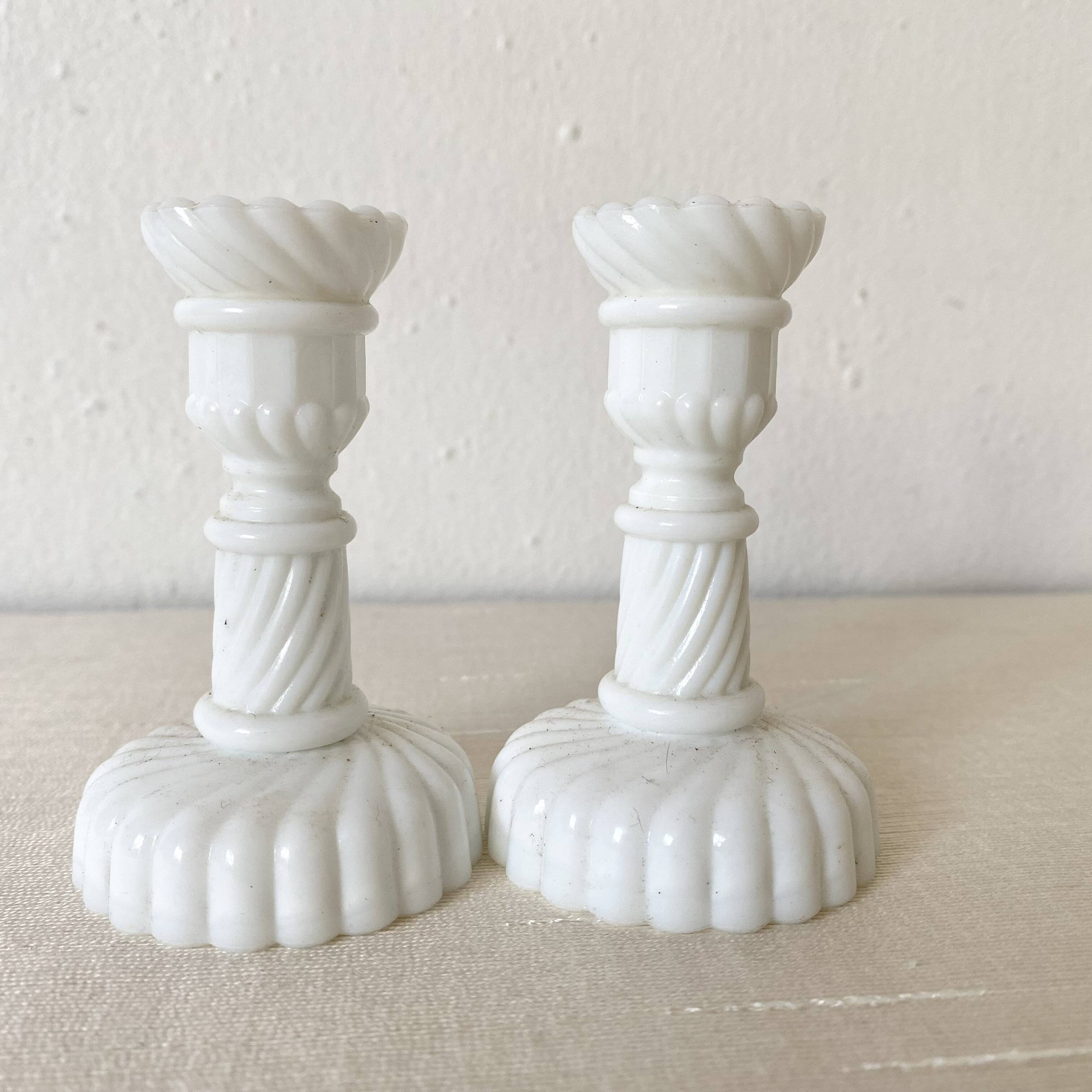 Pair of small white opaline candlesticks