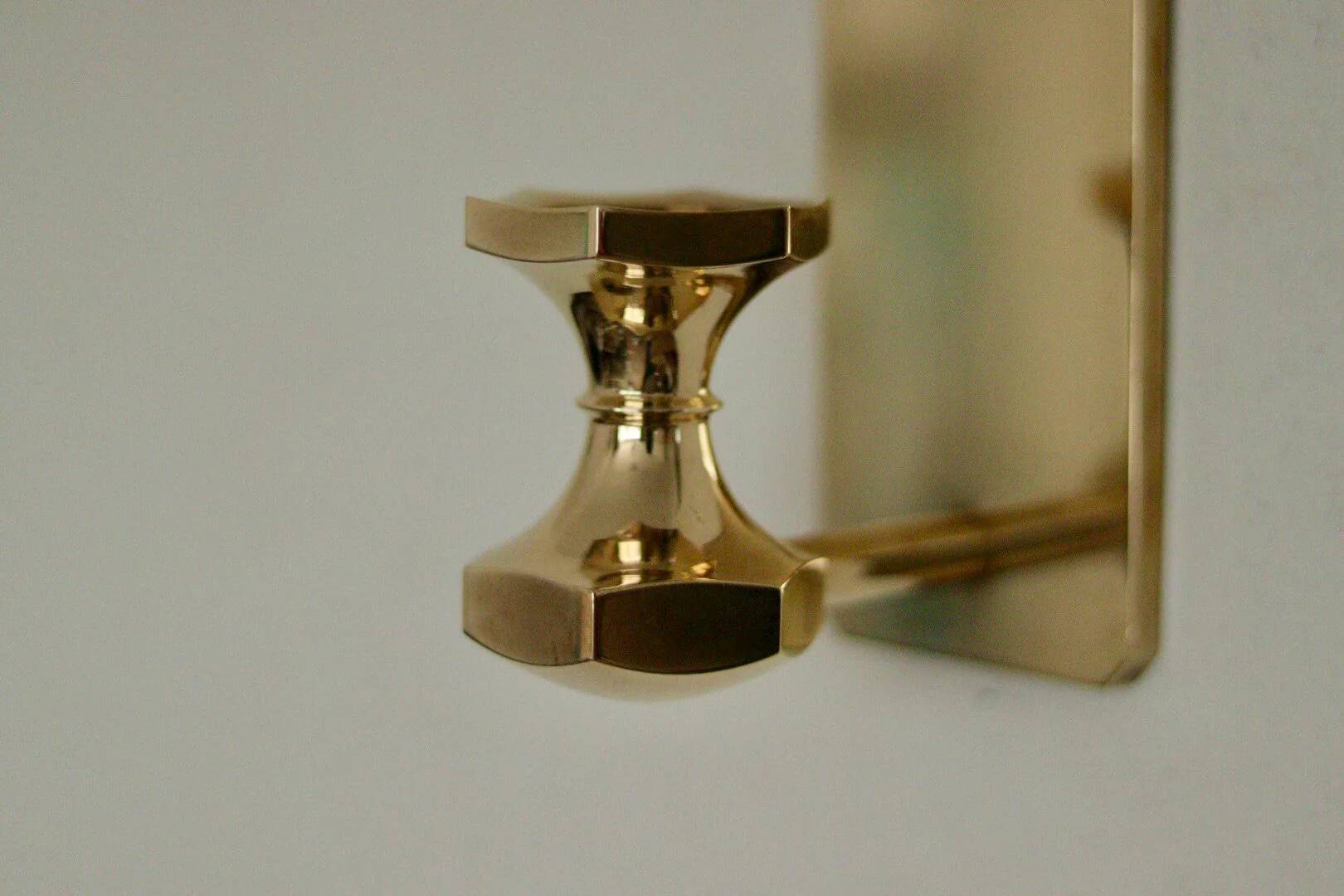 1988, single mid-century Swedish brass sconce by Gusum