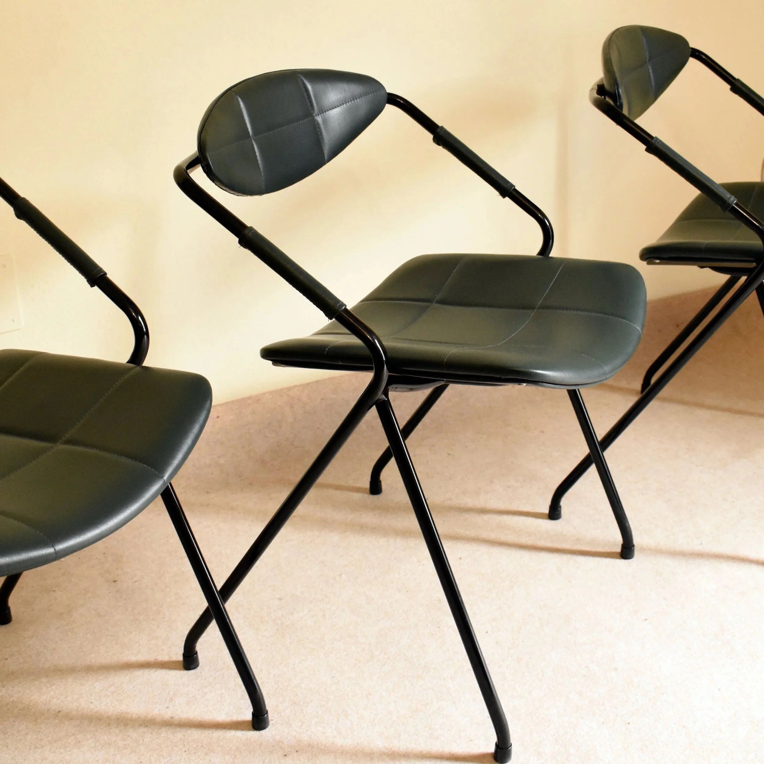 Set of three "Rugby" model chairs by Gilbert Steiner for Steiner, 1962.