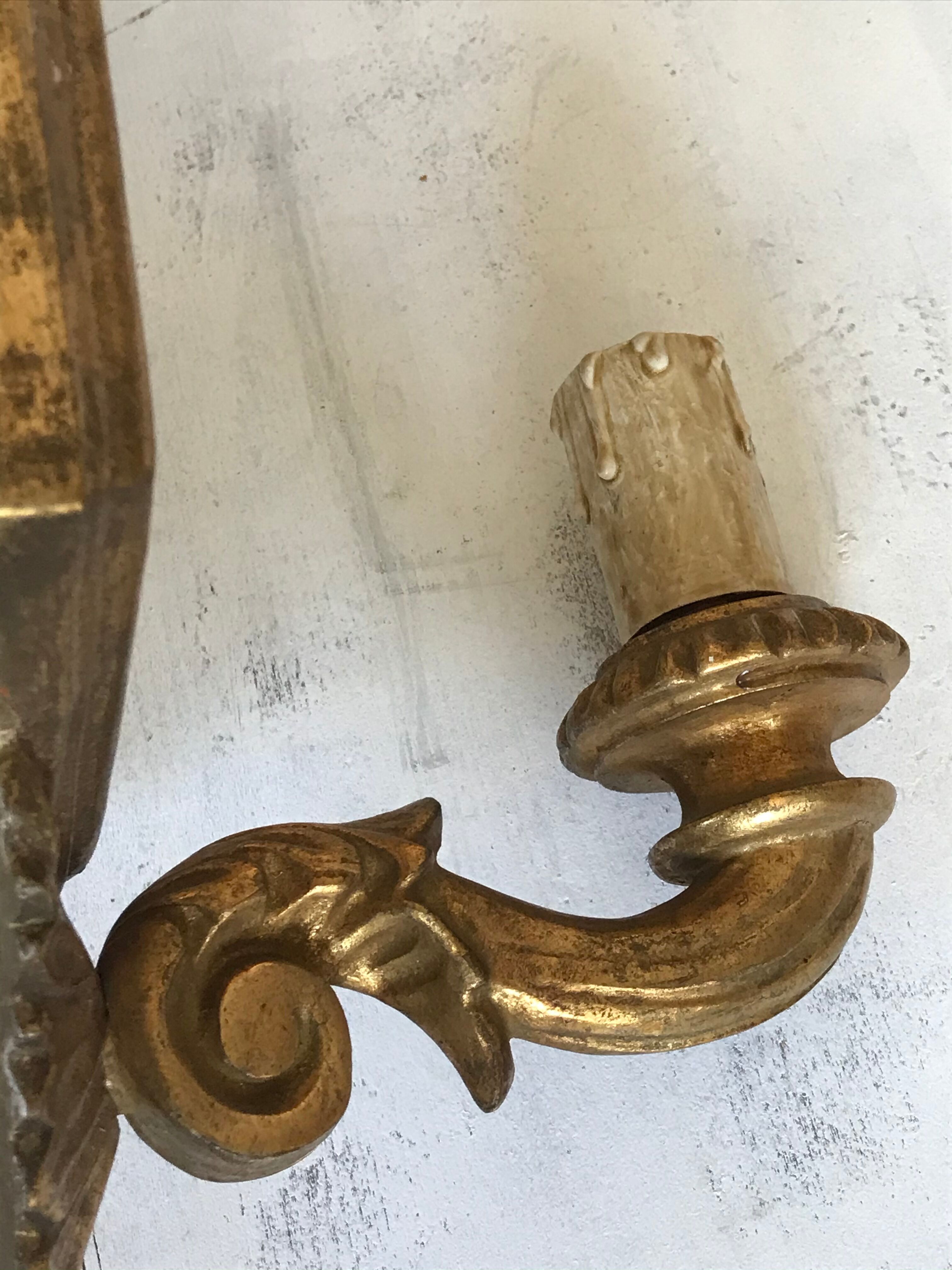 Pair of florentine wall lamps