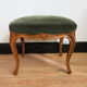 Louis XV footrest in carved wood and green velvet