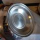 Old English teapot in silver-plated metal and Bakelite.