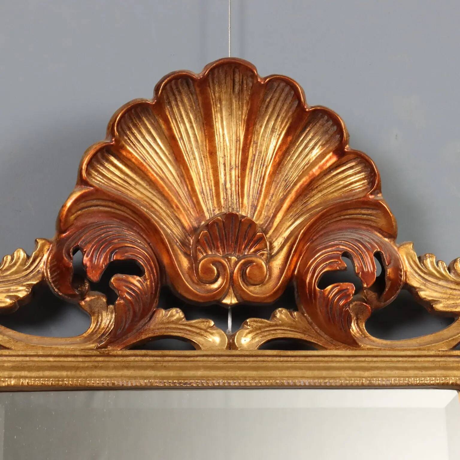 Antique baroque style mirror in carved wood, Italy, 20th century.