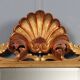 Antique baroque style mirror in carved wood, Italy, 20th century.