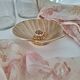 Shell-shaped brass catchall.