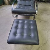 19th century rocking chair + footrest in skyl and chrome metal
