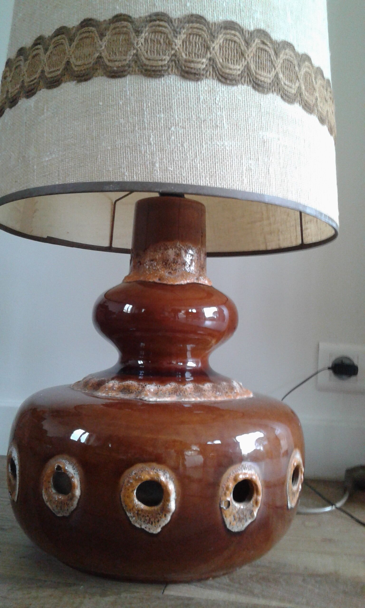Floor lamp with Fat Lava ceramic foot and fabric lampshade.