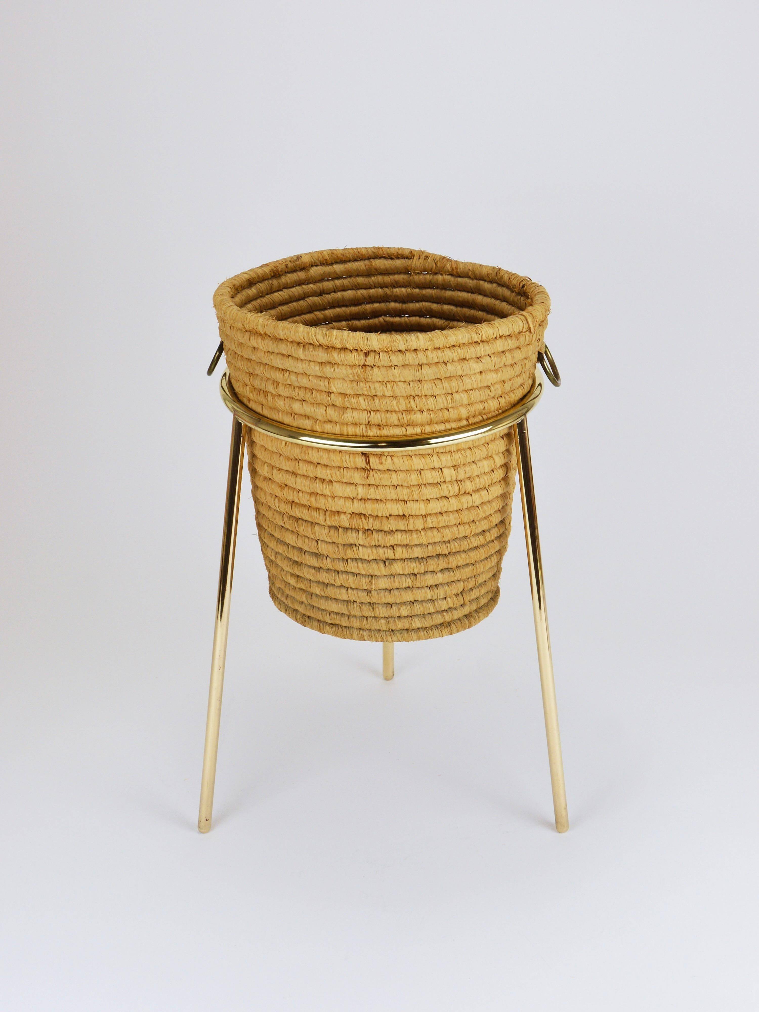 Carl Auböck II paper basket in raffia and brass, umbrella stand, 1950s