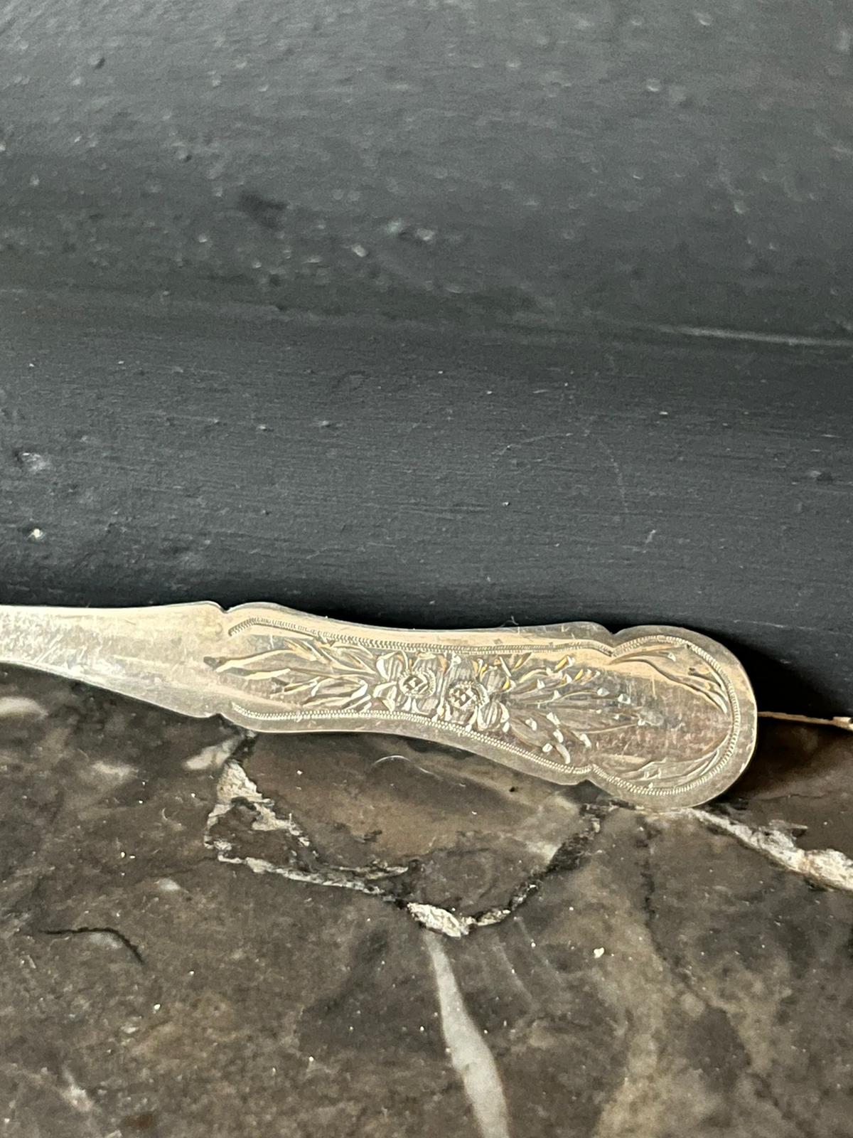 12 silver mocha spoons with flower decoration dating from 1916