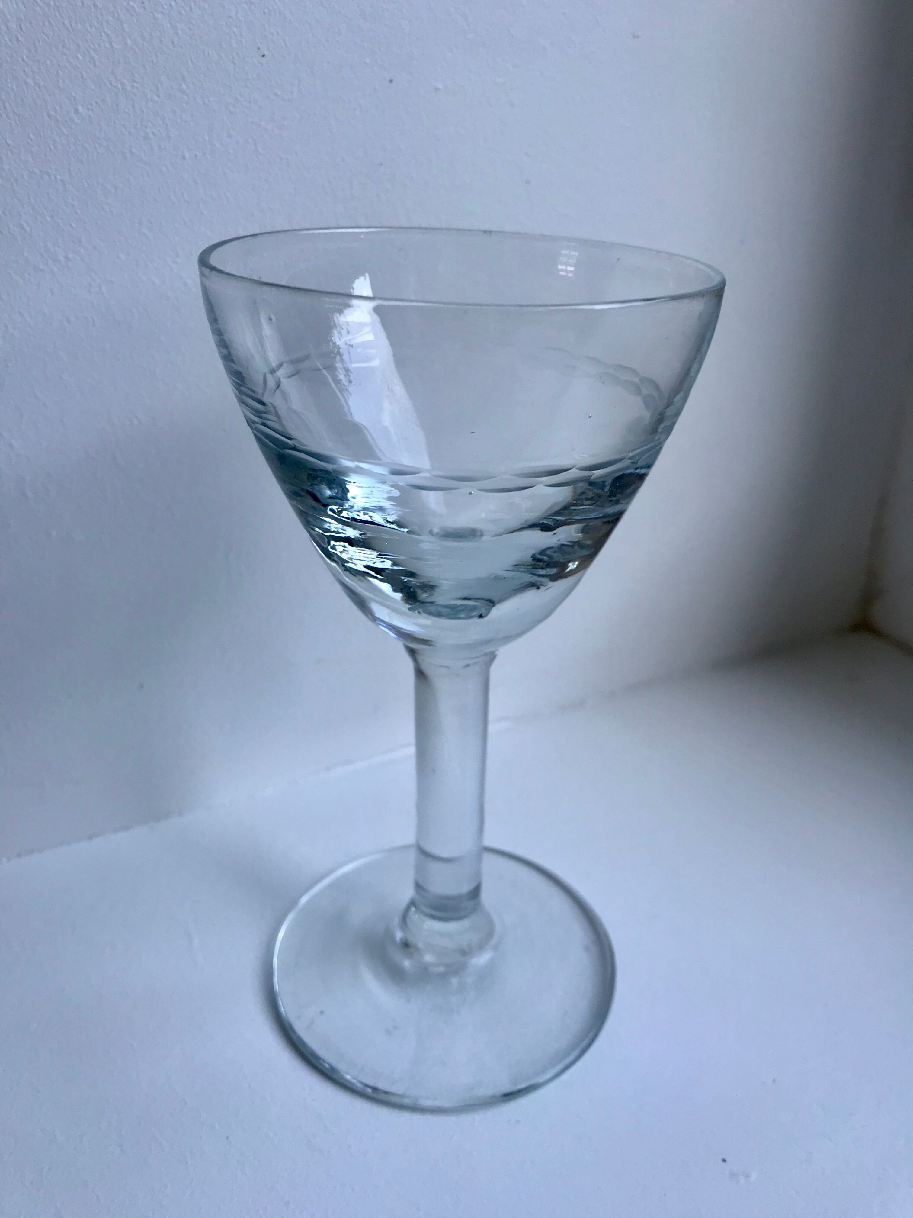 Set of 11 molded glass wine glasses engraved 20s