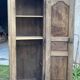 Eighteenth-century Parisian armoire with one bonnetière door in raw wood.