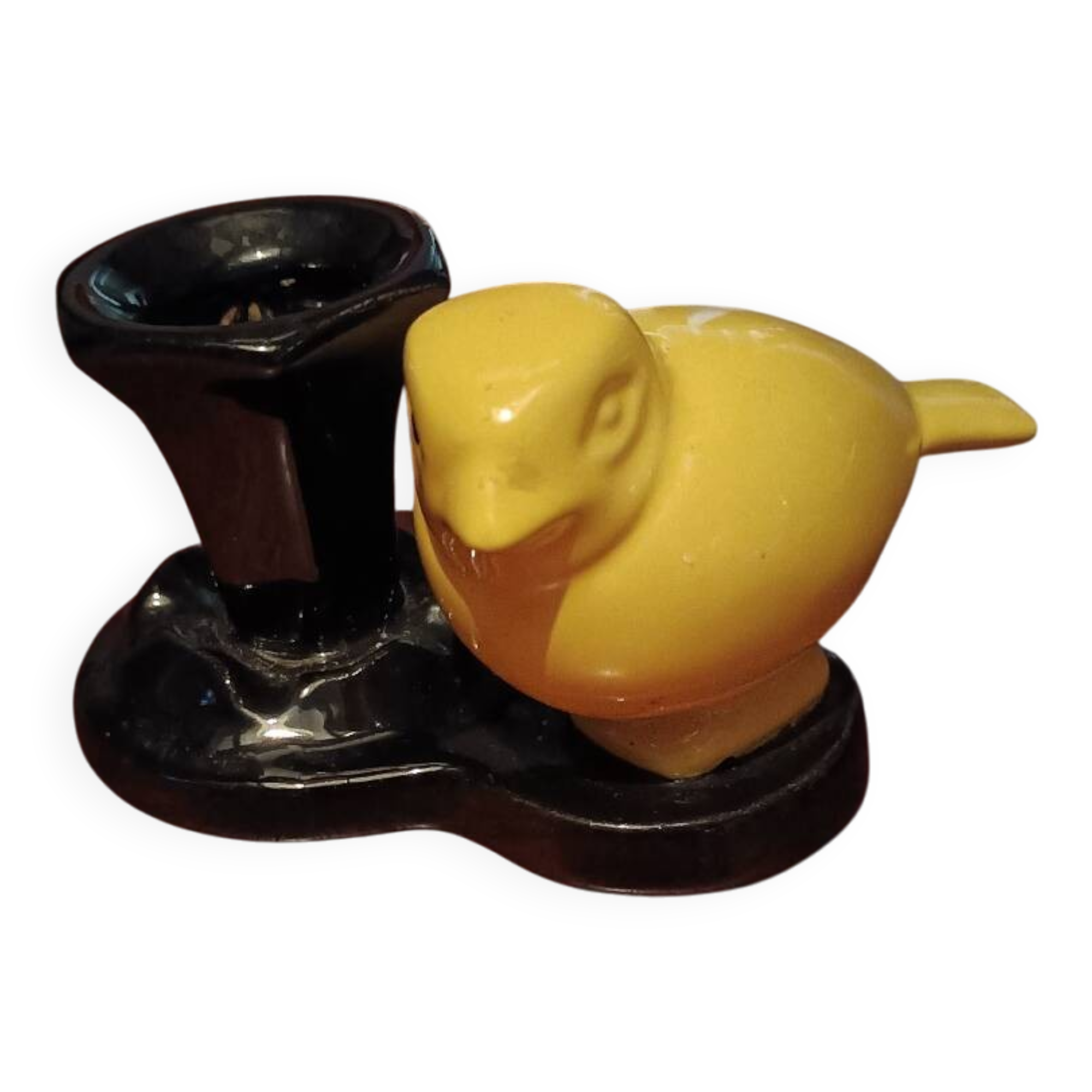 Yellow canary figurine and its candle holder