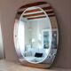 Vintage oval smoked glass mirror