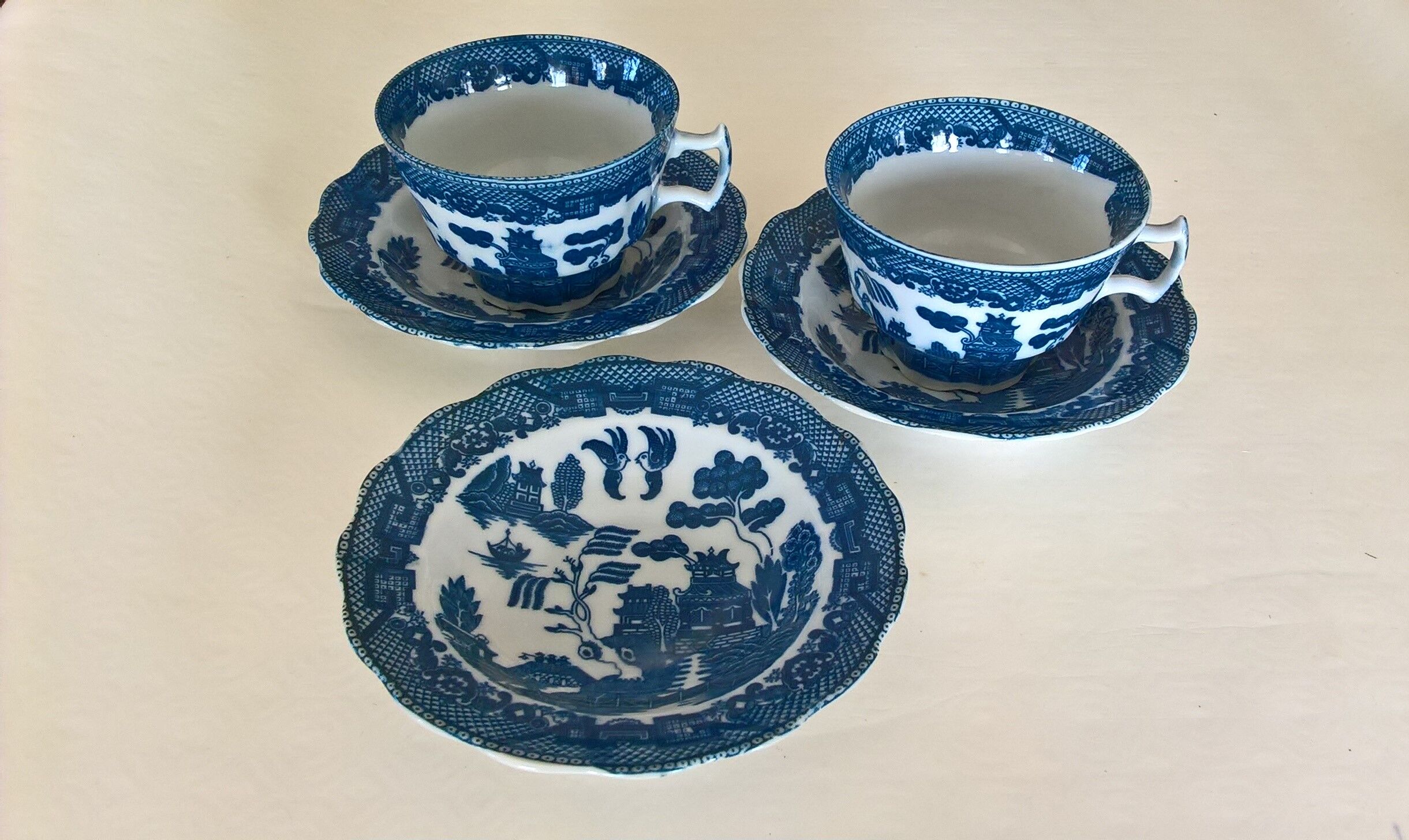 Two Blue Willow porcelain tea cups