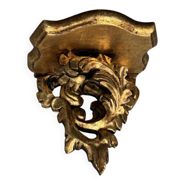 Small wall-mounted console in carved and gilded wood in the Louis XV style.
