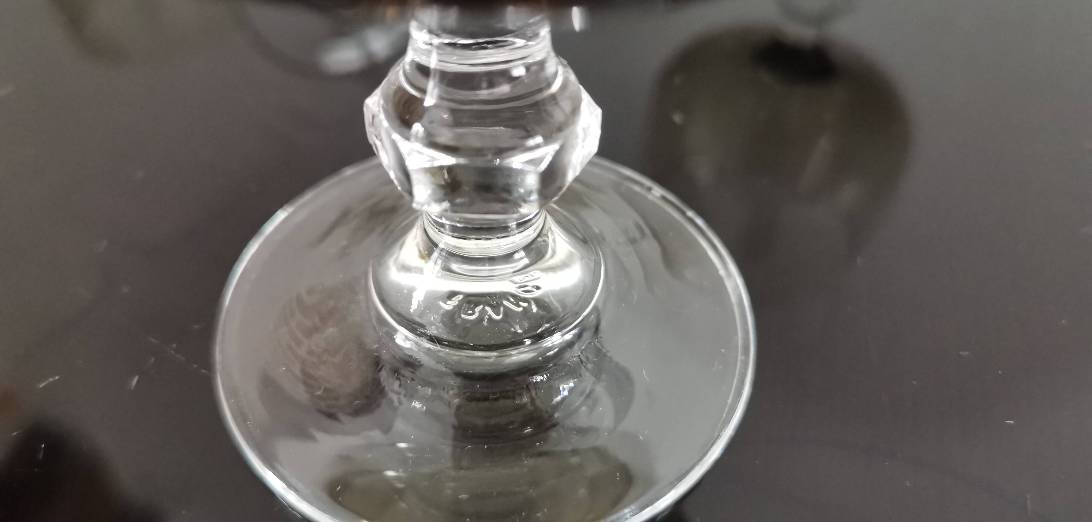 9 white wine glasses on vintage Luminarc smoked black stem