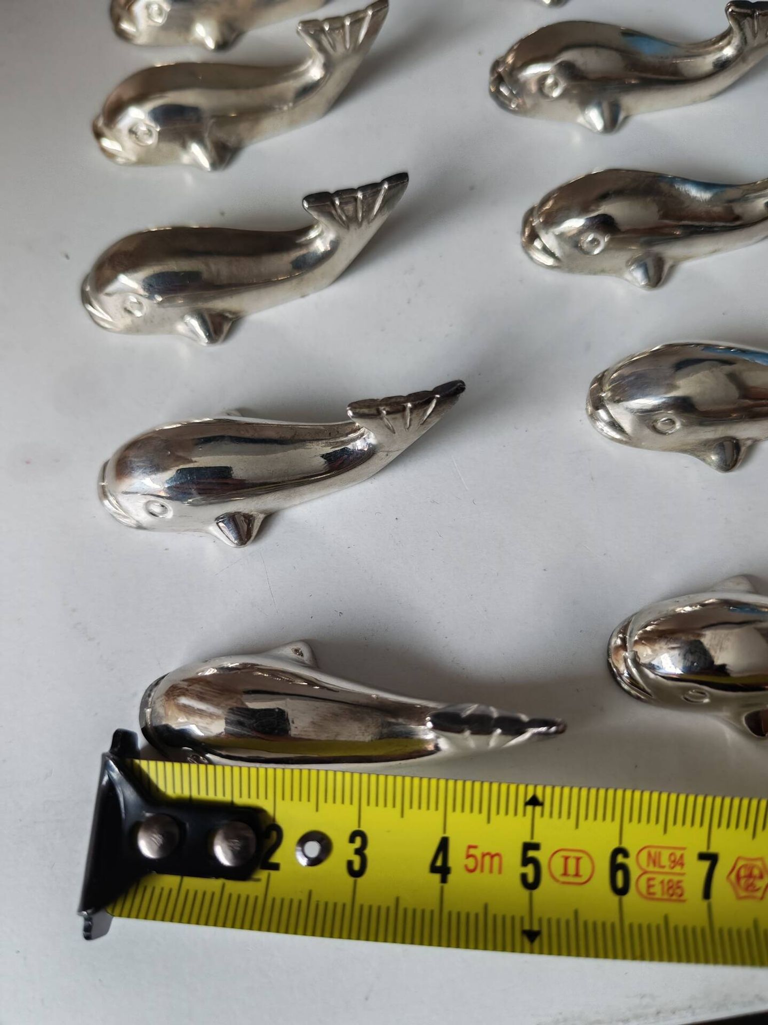 12 silver metal whale knife rests