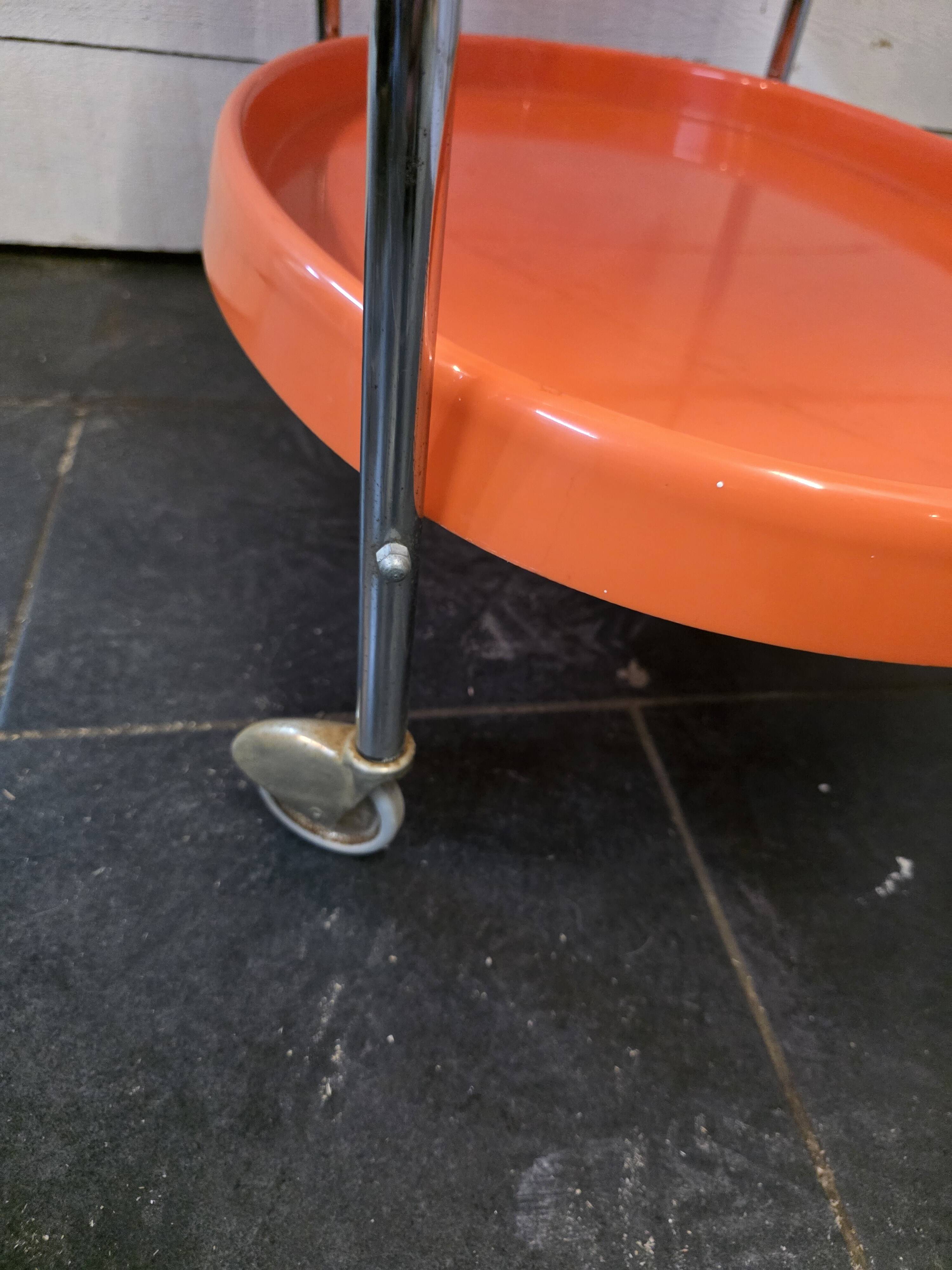 Orange rolling trolley from the 70s