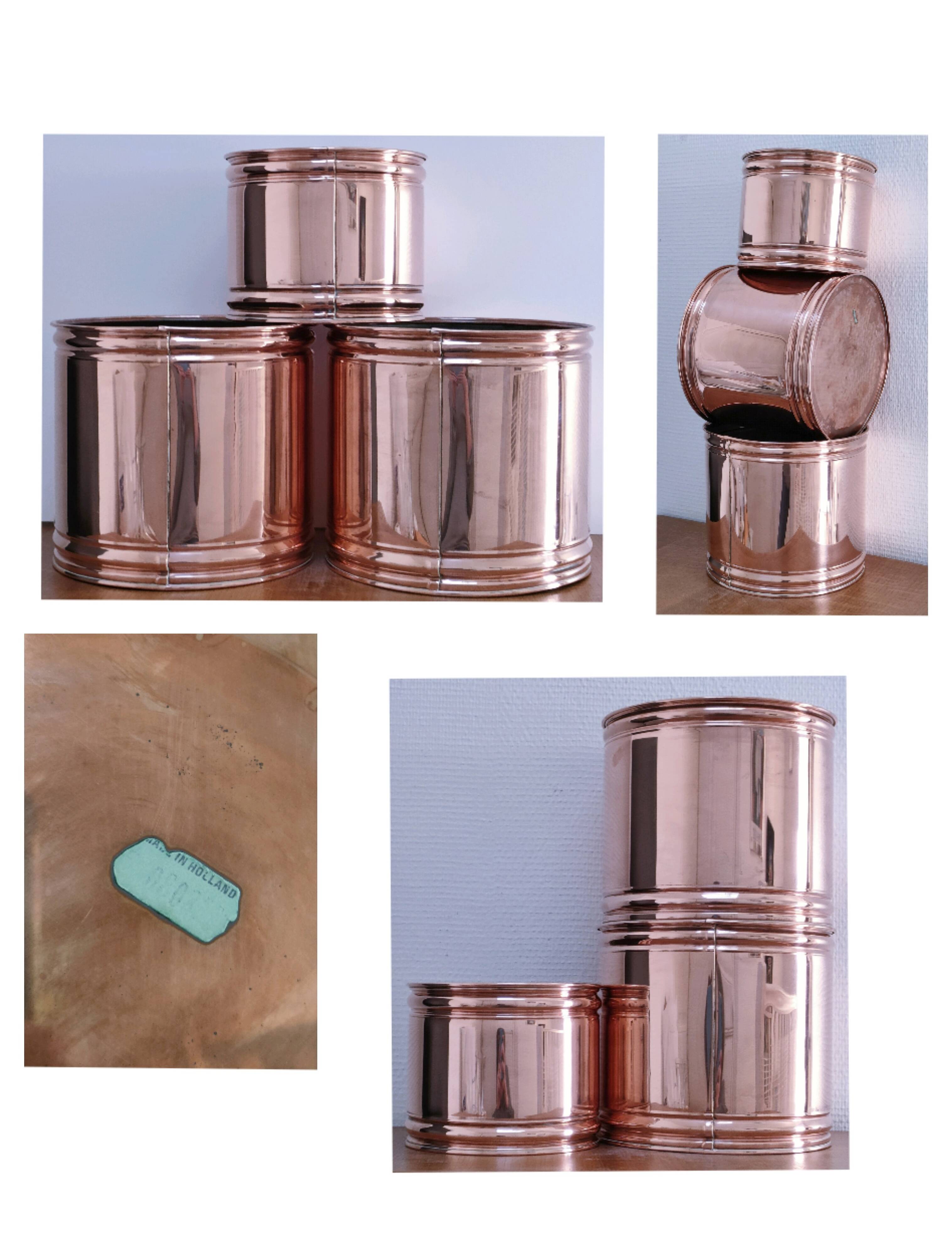 three cylindrical plant pots in a Scandinavian design from the 80s