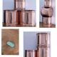 three cylindrical plant pots in a Scandinavian design from the 80s