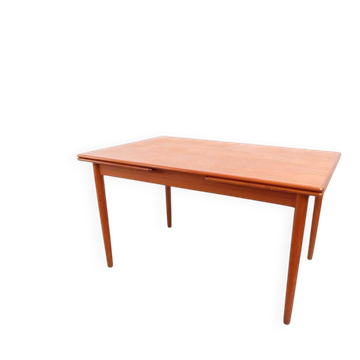 Teak dining table in retro vintage Danish style from the 60s-70s.